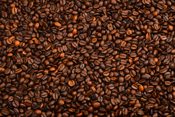 Coffee beans background. Top view. Coffee beans texture.