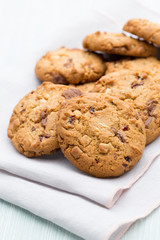 Chocolate oatmeal cookies on the  wooden background.