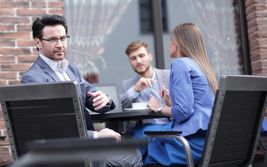 modern businessman on the background of the cafe