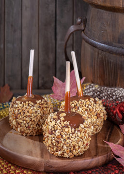 Nutty Taffy Apples In A Rustic Setting