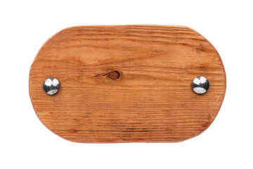 Old oval wooden board with chrome bolts. Isolated
