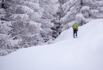 man enjoying cross country skiing