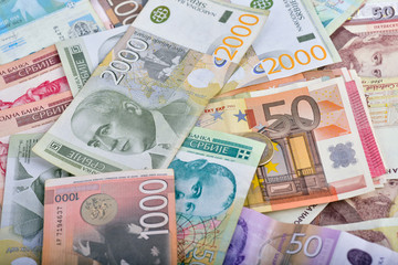 Wealth - scattered money, various currencies
