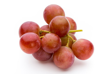 Ripe red grape isolated on white.