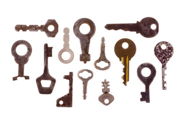 Old vintage keys isolated on white background. Several types of old retro keys. Set of old keys. Composition of different keys.