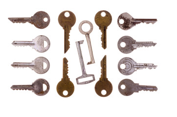Old vintage keys isolated on white background. Several types of old retro keys. Set of old keys. Composition of different keys.