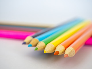 Color pencils on white background.