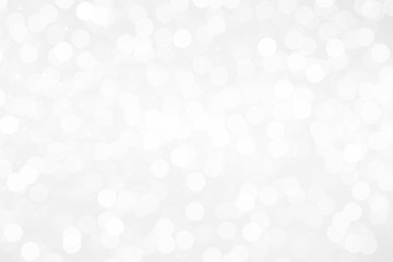 gray bokeh White and Silver lights on bokeh abstract background.