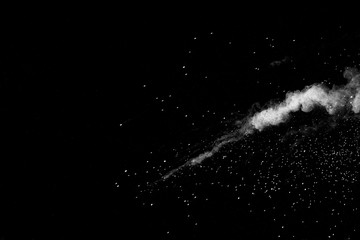 Explosion of white dust on black background. - 227643391