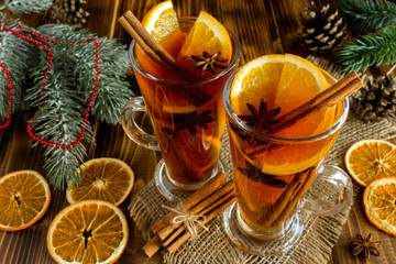 Mulled wine and Christmas composition on the rustic wooden  background