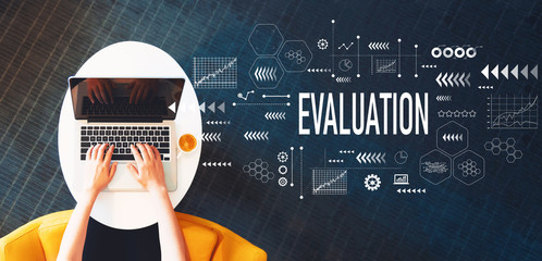 Evaluation with person using a laptop on a white table
