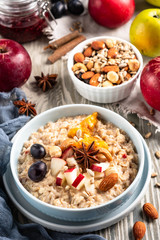 oatmeal with fruit and nuts, healthy breakfast