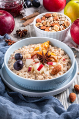 oatmeal with fruit and nuts, healthy breakfast
