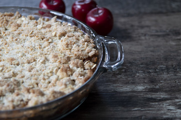 Apple Crisp Crumble Dessert with apples in background