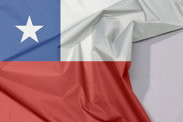 Chile fabric flag crepe and crease with white space, a horizontal bicolor of white and red with the blue square on the upper corner  and the white star in the center.