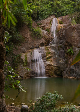 Budlaan waterfalls outdoor activities hiking along a river creek watercourse passing bamboo bridge, series of images in Cebu province