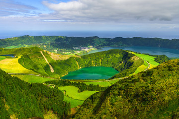 Obraz premium Azores, Portugal. Beautiful view of volcanic lake from the mountains on San Miguel Island