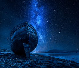 Milky way, falling stars and abandoned shipwreck, Fort William, Scotland