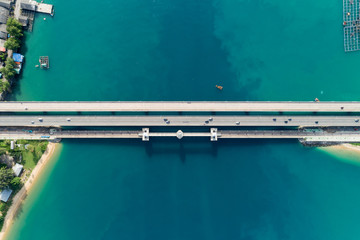 Aerial top view drone shot of bridge with cars on bridge road image transportation background...