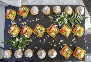 Tasty mix of fruit pastries and mini krapfen