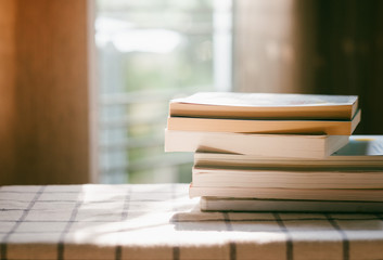 paperback books on a table