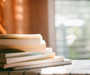 paperback books on a table