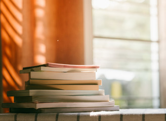 paperback books on a table