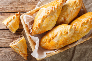Freshly baked Lithuanian lamb meat pies close-up. horizontal top view