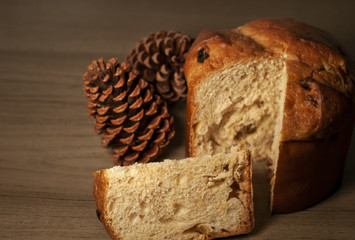 Traditional Christmas panettone with raisins and dried fruits