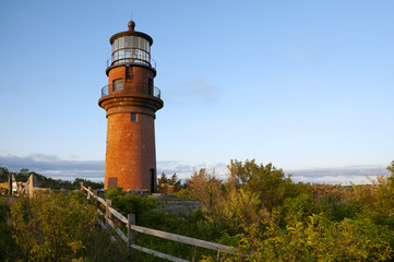 Wooden Fence Near Brick Tower of Aquinnah Lighthouse in Martha's Vineyard Island