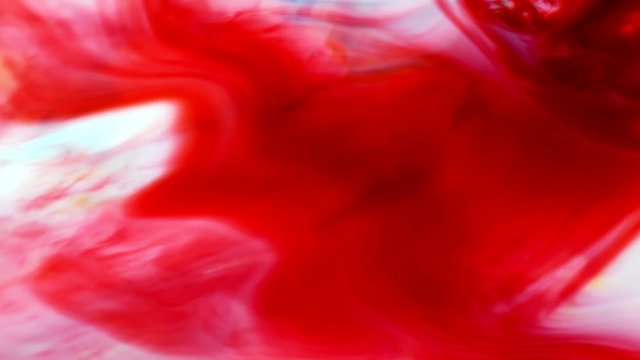 Abstract colorful paint, mixing and movement of multicolored paint in water. Multicolored acrylic paint. Fantastic surface.