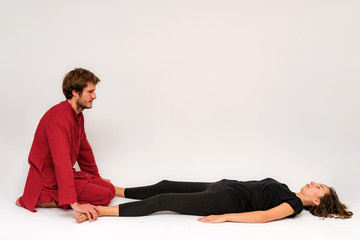 Fototapeta premium Photo of yoga poses for two stretching and relaxing on a white background.