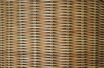 Front view of natural brown rattan furniture surface for background, banner and pattern 