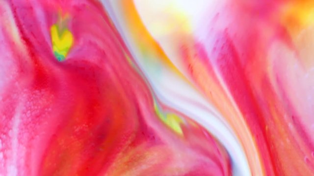 Abstract colorful paint, mixing and movement of multicolored paint in water. Multicolored acrylic paint. Fantastic surface.