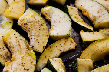 Tasty vegetarian food. Roasted zucchini with spices.