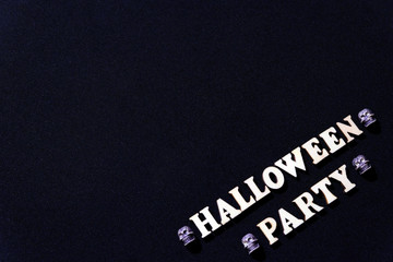 An inscription from wooden letters for Halloween.