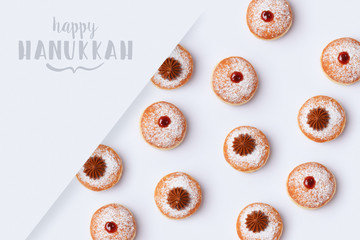 Jewish holiday Hanukkah sufganiyot on white background