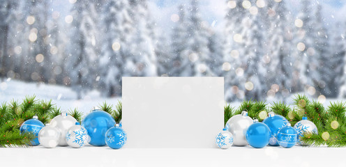 Blank Christmas card laying on blue baubles and gift 3D rendering