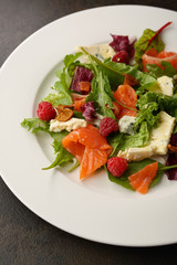 Fresh salad with fish and cheese