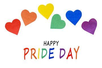 Paper hearts of rainbow color on white background with text happy pride day. LGBT flag symbol. greeting card