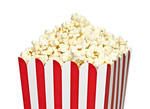 Popcorn in striped paper or carton bucket isolated on white background