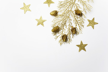 Christmas composition. christmas golden decorations on light background. Top view, flat lay