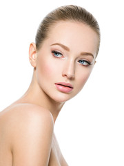 Beautiful face of young woman with perfect health fresh skin