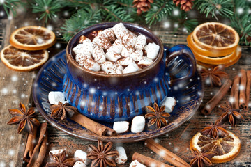 Cup of creamy hot chocolate with melted marshmallows