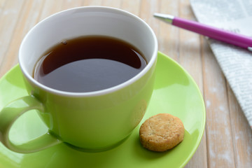 Coffee and cookie Newspaper Tabletop