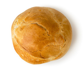 A loaf of fresh bread on a white. The view from the top.