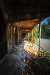 Obraz premium Graffiti and views of the abandoned city of Consonno (Lecco, Italy).