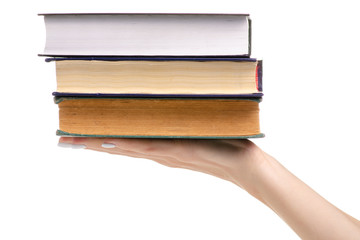 Stack of books in hands on a white background. Isolation