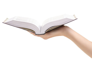 Book law religion in hand on white background isolation
