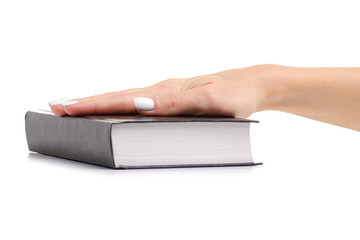 Book law religion in hand on white background isolation